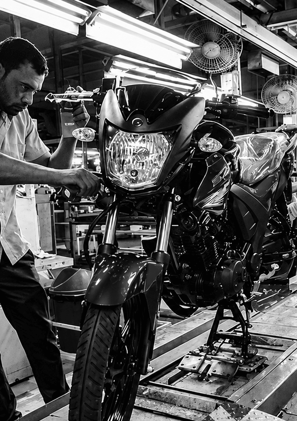 Yamaha technician servicing a motorcycle in the Velocity Red workshop